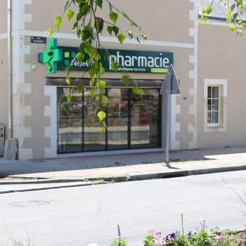 Transformation et extension d'un bâtiment ancien en Pharmacie 1